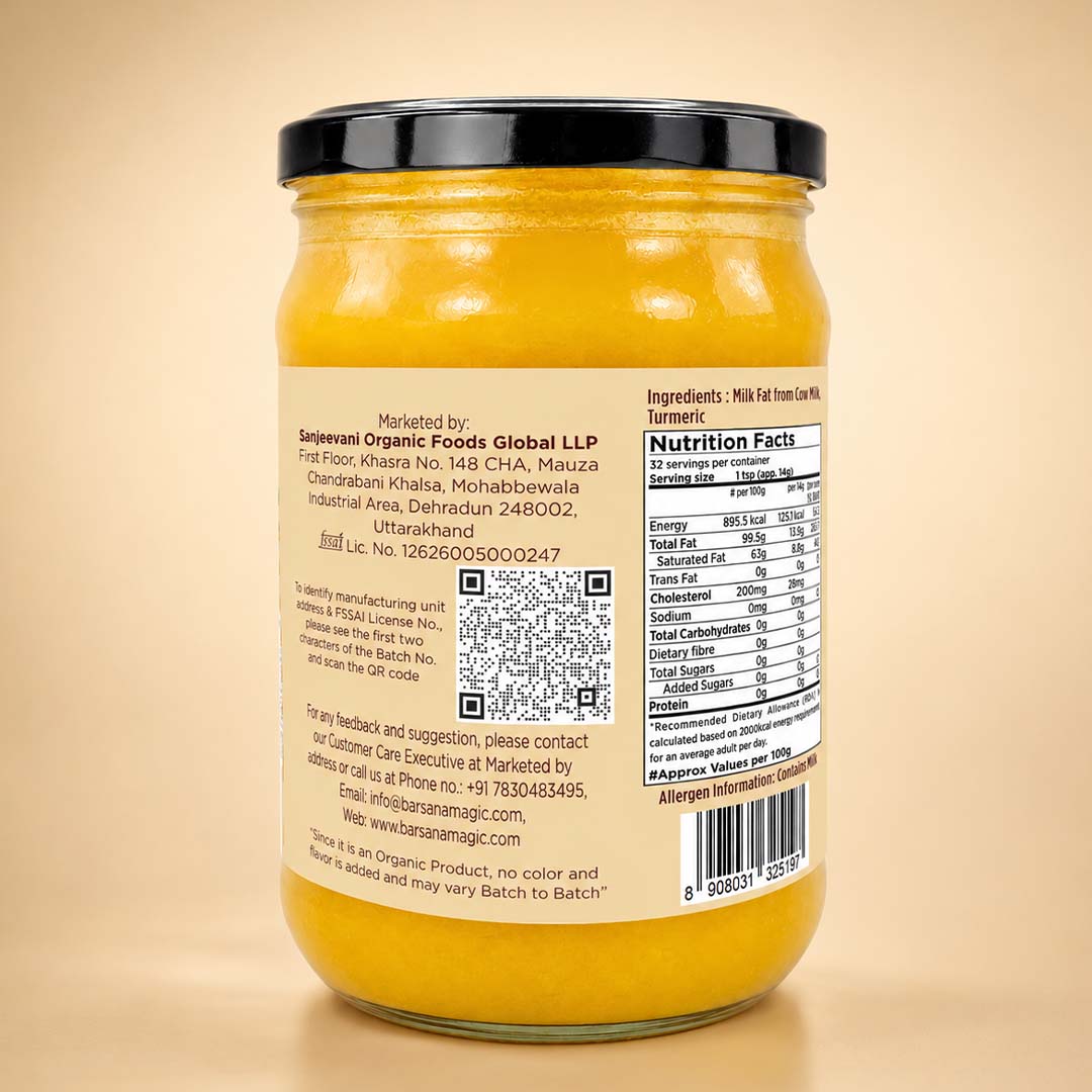 Barsana Magic and A glass jar of yellow ghee with a black lid, showing the back label with ingredients, nutrition facts, and a QR code, set against a warm beige background.