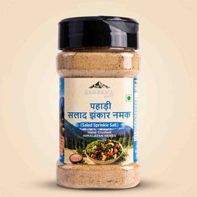 Barsana Magic and A bottle of Parsana Himalayan Hand Crushed Salt with a black lid and a colorful label, set against a light beige background.