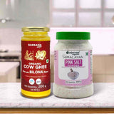 Barsana Magic and Two jars of organic cow ghee and pink salt powder on a kitchen counter.