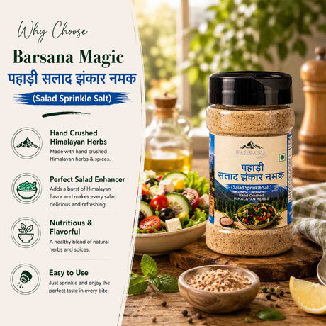 Barsana Magic and A bottle of Barsana Magic Salad Sprinkle Salt is shown on a rustic wooden table with a salad bowl, pepper grinder, and lemon slice. A vertical text panel on the left explains the benefits of using Barsana Magic hand-crushed herbs.