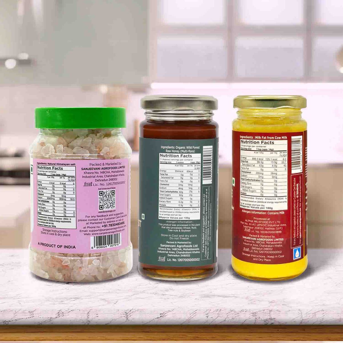 Barsana Magic and Three jars with labels on a kitchen counter