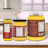 Barsana Magic and Three jars of Sanjeevani mustard on a kitchen counter with visible labels.