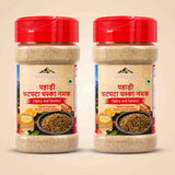 Barsana Magic and Two plastic jars of Parsana Brand Pahari Chutka Chashna Namak (spicy and savory Himalayan herbs) with red lids, displayed side-by-side on a light beige background.