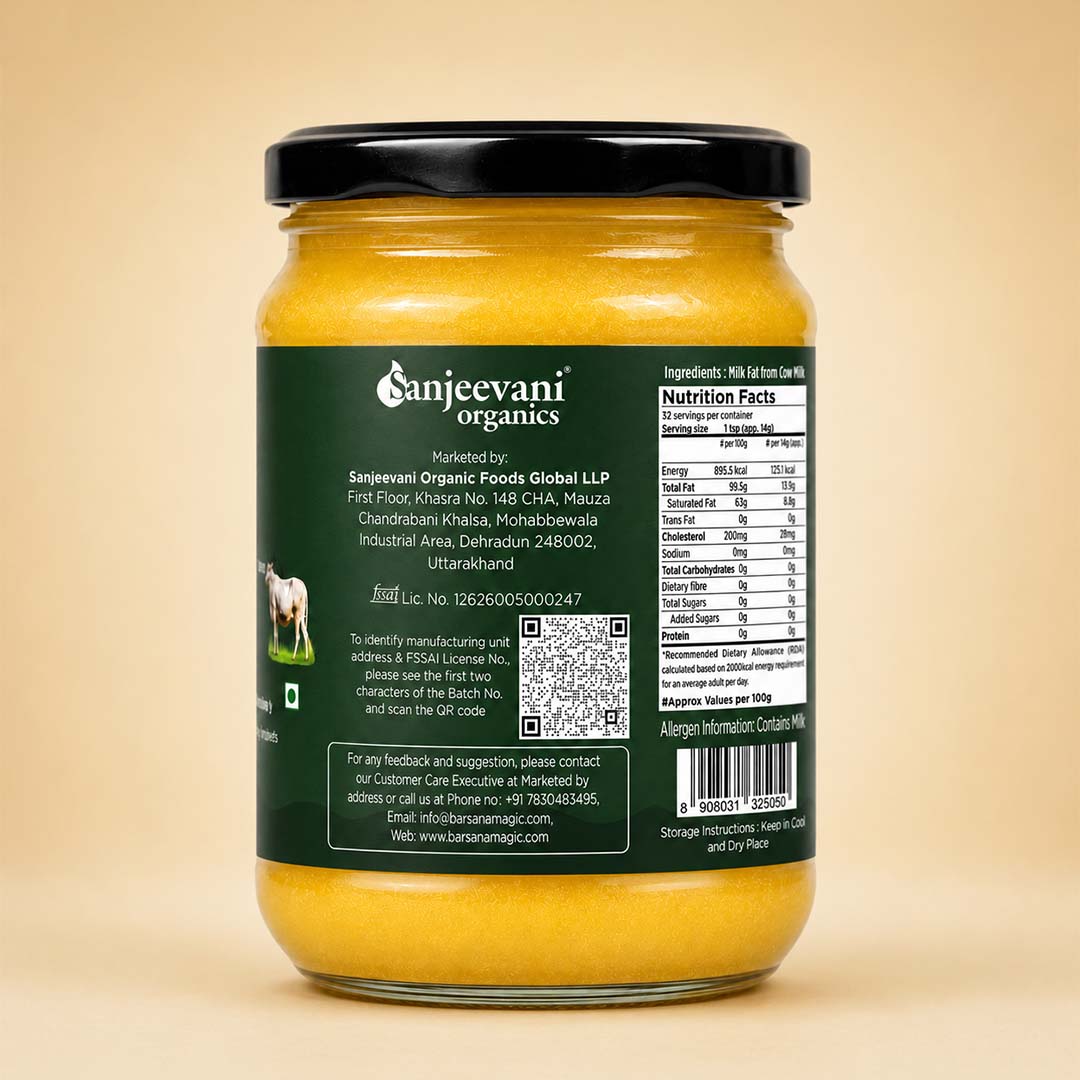 Barsana Magic and A jar of Sanjeevani Organics Garam Masala Spice Mix, showing the back of the dark green label with product details, nutrition facts, and a barcode, set against a solid beige background.