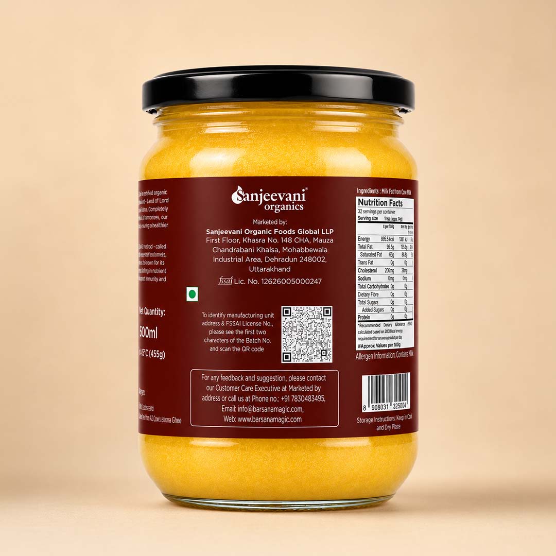 Barsana Magic and A 500ml glass jar of Sanjeevani Organics Sanjeever Organic Foods Global LLP Turmeric Powder, showing the back label against a solid beige background.
