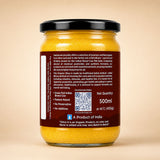 Barsana Magic and A 500ml jar of organic Cow Gulei powder by Brand A, showing the back label in a studio setting against a warm beige background.