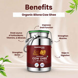 Barsana Magic and A large metal canister of Barsana Organic Cow Ghee is centered on a beige promotional background with text callouts listing benefits such as improved brain function, strengthened muscles, bones, and digestion. The canister has a dark red label, a green lid, and silver metal body with handle.
