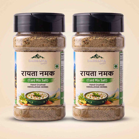 Barsana Magic and Two jars of Barsara Valley Rayata Namak (Curd Mix Salt) hand crushed Himalayan herbs, displayed side-by-side on a light beige background.