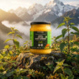 Barsana Magic and Jar of Nettle Dairy Spread with mountainous landscape in the background