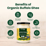 Barsana Magic and A jar of Barsana Organic Buffalo Ghee centered on a light wood background with green circular icons and text outlining the benefits of organic buffalo ghee, including nutrition, immunity, digestion, skin and hair health, and bone support.