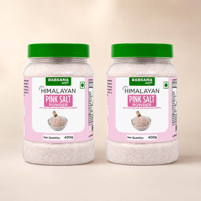 Barsana Magic and Two jars of Barsana Himalayan Pink Salt Powder, 400g each, with green lids and pink labels, set against a warm beige background.