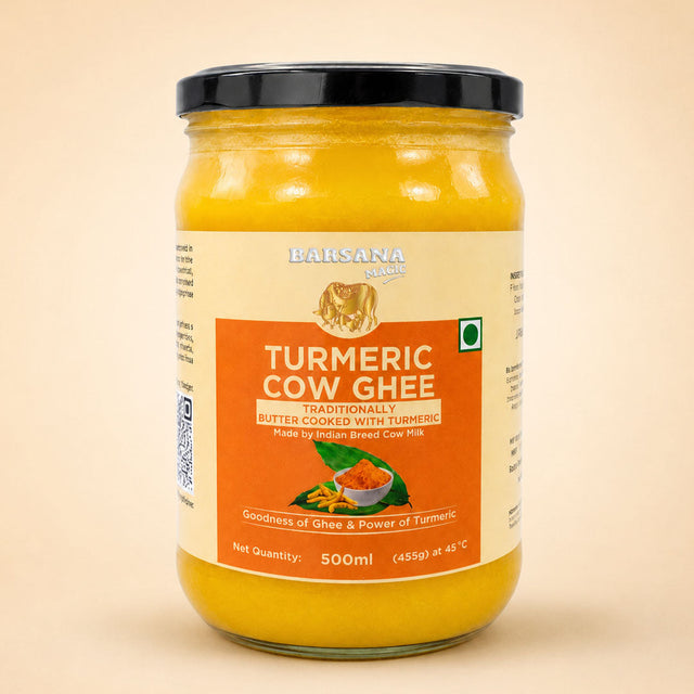 Barsana Magic and A 500ml glass jar of Barsana Turmeric Cow Ghee, showing the bright yellow ghee through the clear glass, with a cream and orange label and a black lid, set against a solid beige background.
