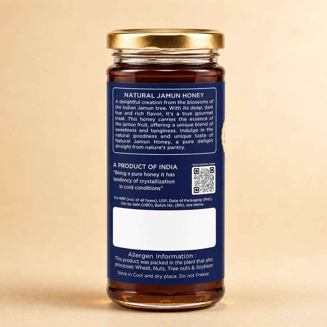 Barsana Magic and A glass jar of Natural Jamun Honey with a gold metal lid and a dark blue label, set against a warm beige background.