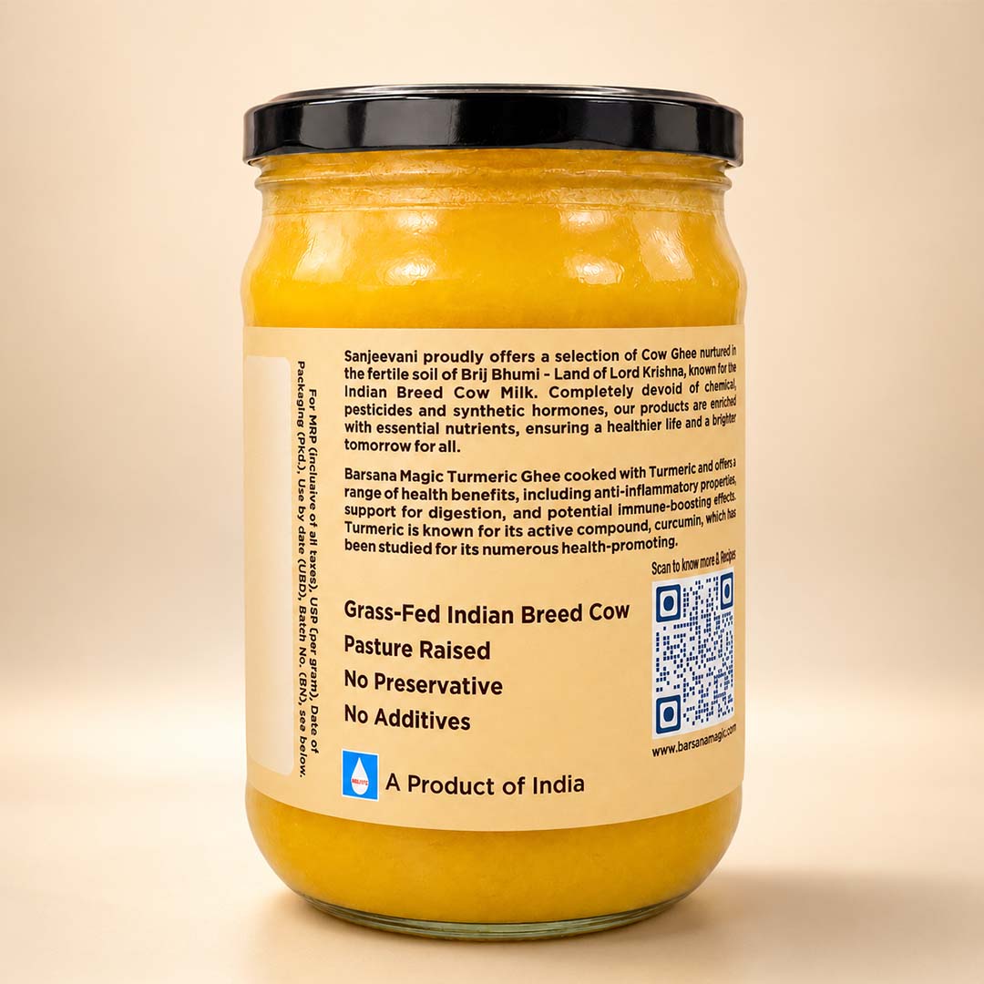 Barsana Magic and A glass jar of cow ghee with a black lid and a beige label, photographed against a plain beige background. The label contains text and a QR code, with the Sanskrit brand name 'Barasa Magic Turmeric' visible.