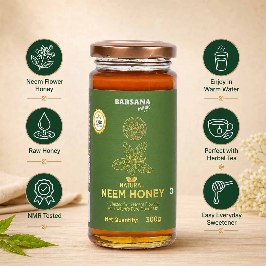 Barsana Magic and A 300g glass jar of Barsana Magic Natural Neem Honey, featuring a green label and a brown lid, displayed on a wooden surface with decorative honeycomb and green leaves. The jar is flanked by six circular green icons with white text highlighting product features like 'Neem Flower Honey', 'Raw Honey', and 'NMR Tested'.