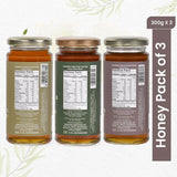 Trio of 100% natural honey jars in Acacia, Mustard, and Van Tulsi flavors, showcasing golden hues and pure, unpasteurized goodness.