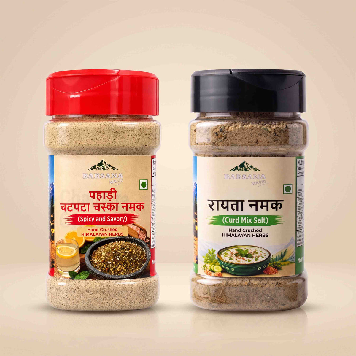 Barsana Magic and Two jars of Barmenara Maje spices on a light beige background: a red-capped Hand Crumbled Himalayan Salt jar on the left and a black-capped Hand Countered Himalayan Herbs jar on the right.