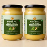 Barsana Magic and Two jars of Barsana Herbal Cow Ghee displayed side-by-side against a solid beige background. The jars are filled with a golden-yellow ghee and feature light green labels with dark green text panels, black lids, and a small illustration of a cow on each label.