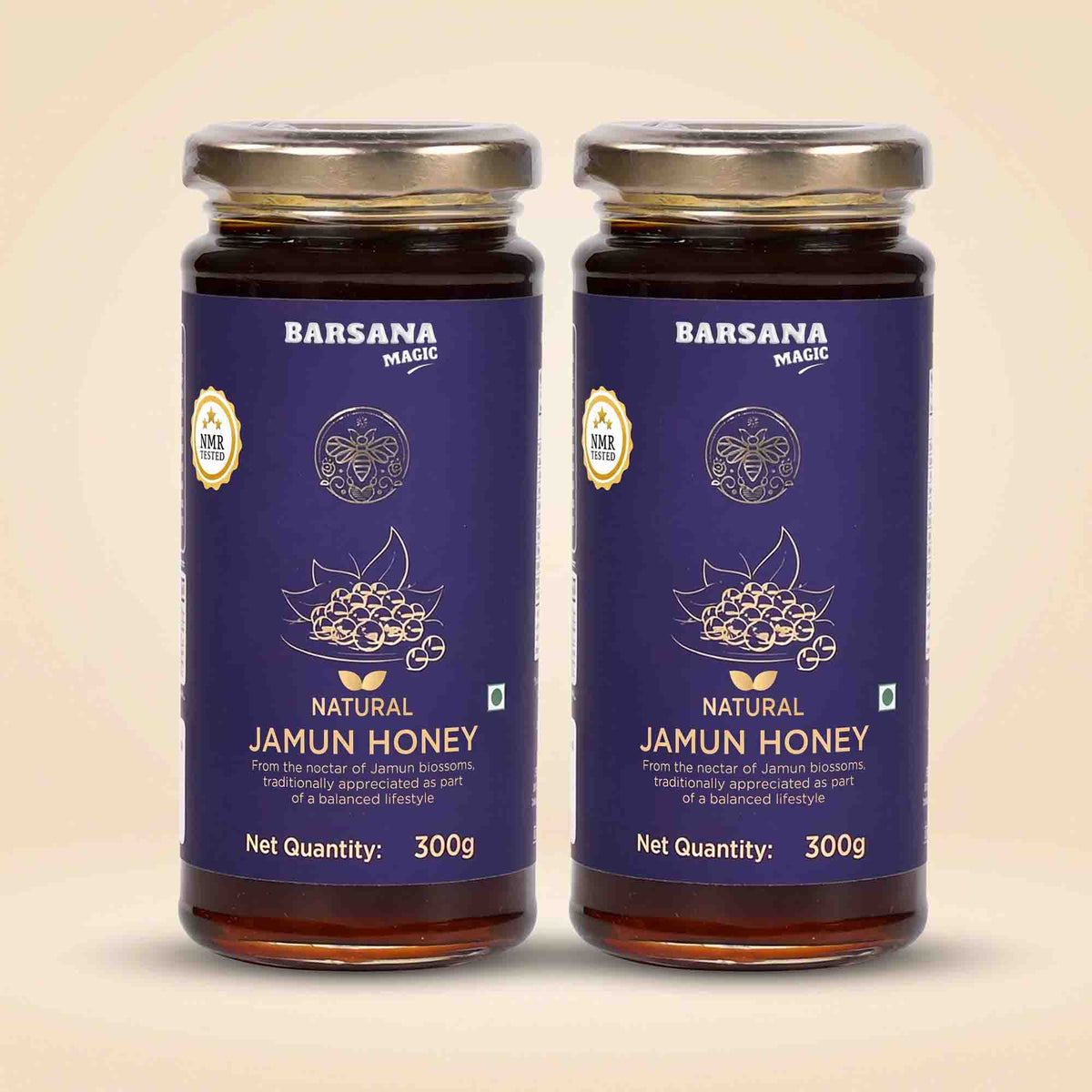 Barsana Magic and Two 300g glass jars of Barsana Magic Natural Jamun Honey, featuring dark purple labels with gold foil details and silver metal lids, set against a light beige background.