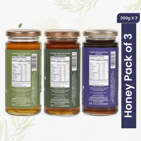 Trio of natural honey jars featuring Neem, Van Tulsi, and Jamun variants, showcasing golden hues and pure, raw textures.
