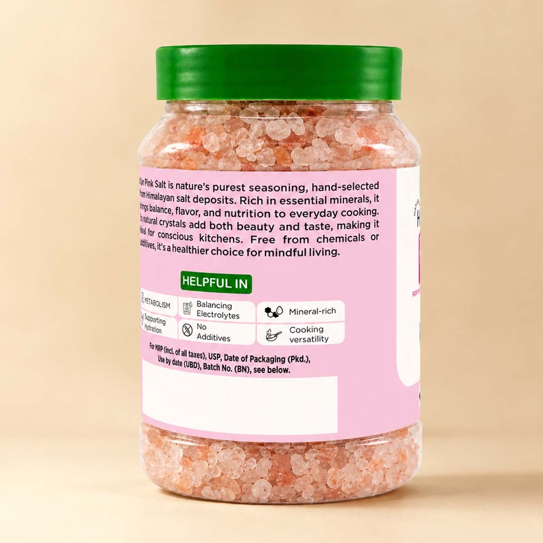 Barsana Magic and A jar of Himalayan pink salt with a green cap and a pink label, shown against a solid beige background.