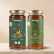 Barsana Magic and Two 300g glass jars of Barsana Honey displayed side by side on a light beige marble surface against a soft beige background. The left jar contains Organic Wild Forest Honey with a dark green label, and the right jar contains Natural Van Tulsi Raw Honey with a matching dark green label.